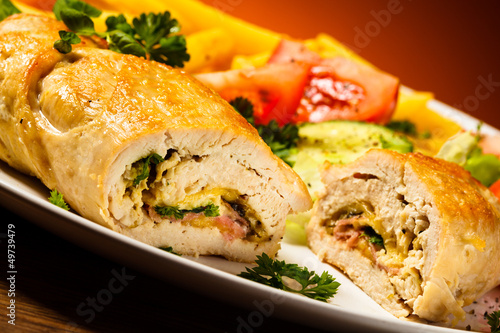 Photo: Fried wrapped meat, French fries and vegetables Fried wrapped meat, French fries and vegetables
