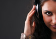 beautiful brunette in headphones