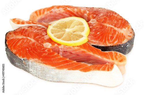 Photo: Pieces of red fish isolated on white Pieces of red fish isolated on white