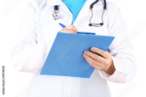 Photo: Medical doctor with stethoscope and clipboard isolated on white Medical doctor with stethoscope and clipboard isolated on white