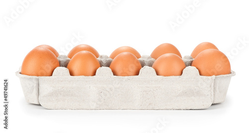 Photo: brown eggs in a carton package brown eggs in a carton package