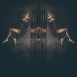 Underwater abstract portrait of young woman