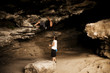 Young woman taking climbing lessons
