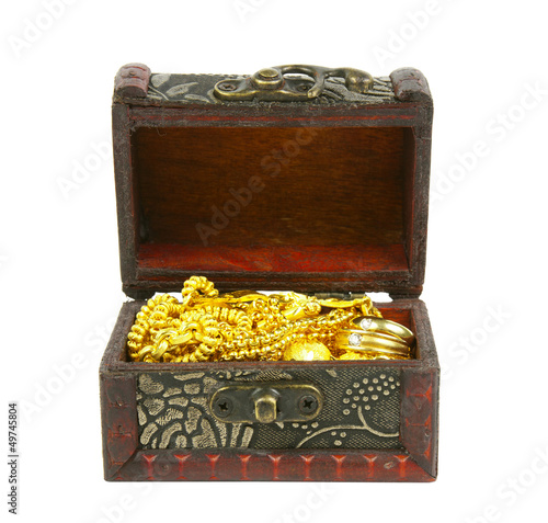 Photo: gold in ancient treasure chest gold in ancient treasure chest