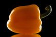 Photo: yellow sweet pepper on a black background yellow sweet pepper on a black background