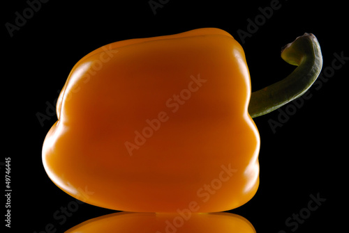 Photo: yellow sweet pepper on a black background yellow sweet pepper on a black background