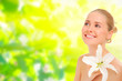 Young healthy woman on spring background