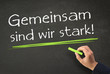 Photo: Gemeinsam sind wir stark! - Motto auf Kreidetafel Gemeinsam sind wir stark! - Motto auf Kreidetafel