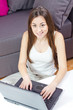happy student girl using laptop