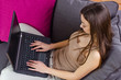 teenage girl using laptop