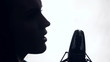 Video: silhouette of woman singing silhouette of woman singing