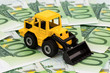 Bagger auf Euro-Banknoten