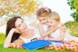 Mother with two kids outdoors