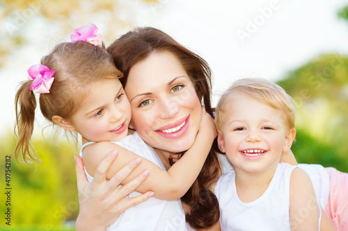 Photo: Mother with two kids Mother with two kids