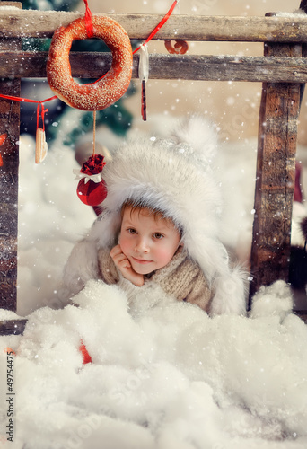 Photo: creative photo card is a smiling boy in a fur hat creative photo card is a smiling boy in a fur hat