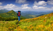 Photo: Hiker in the summer mountains Hiker in the summer mountains