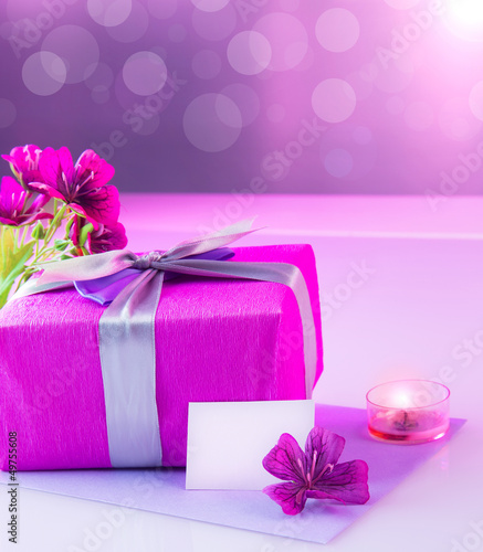 Photo: Pink present with flowers bouquet Pink present with flowers bouquet