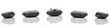 Petal on spa stone with water drops