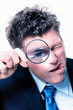 businessman with magnifying glass
