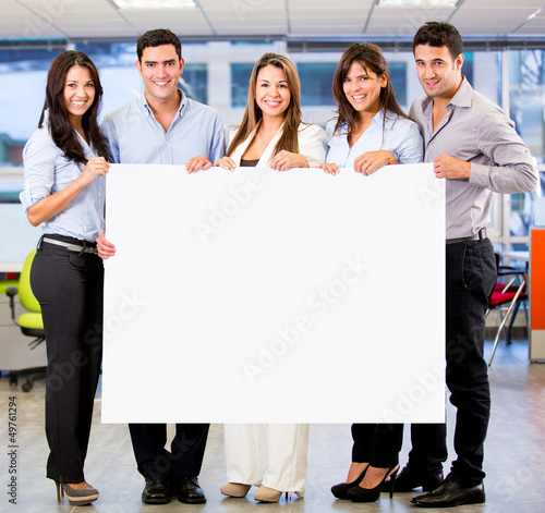 Photo: Business group with a banner Business group with a banner