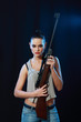 woman holding weapon