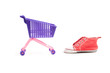 Conceptual photo with miniature shopping-cart