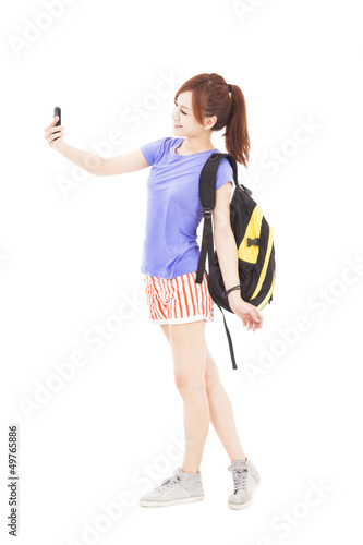 Photo: happy young woman looking the smart phone happy young woman looking the smart phone