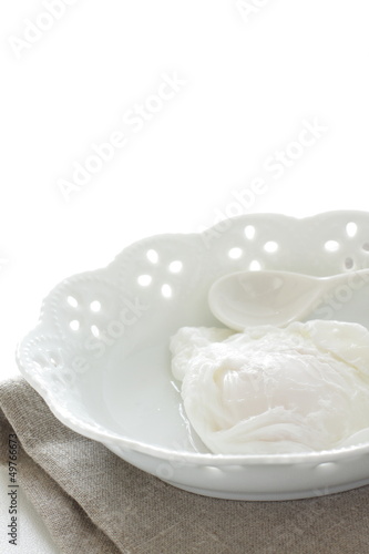Photo: poached egg on elegant bowl for gourmet breakfast iamg poached egg on elegant bowl for gourmet breakfast iamg