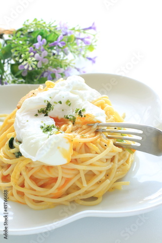 Photo: italian cuisine, poached egg on carbonara spaghetti italian cuisine, poached egg on carbonara spaghetti