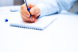 Image of businessman hand writing
