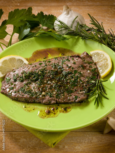 Photo: beef steack with garlic and mixed herbs beef steack with garlic and mixed herbs