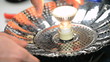 Electrcian checking a light