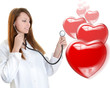 Cheerful female doctor listening heartbeat