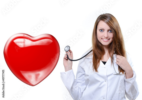 Photo: friendly female doctor listening heartbeat friendly female doctor listening heartbeat