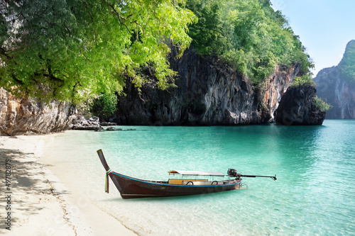 Photo: boat on beach of island in Krabi Province, Thailand boat on beach of island in Krabi Province, Thailand