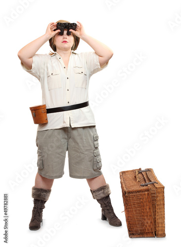 Photo: Retro style traveler with suitcase going on a vacation. Retro style traveler with suitcase going on a vacation.