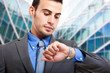 Businessman checking the time