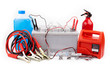 Car battery and  jumper cables  isolated on white