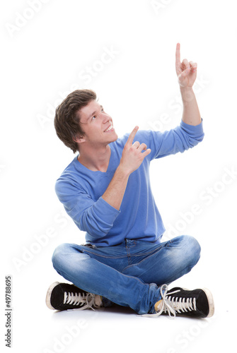 Photo: teen pointing up teen pointing up