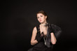 The girl in the retro image of a black background