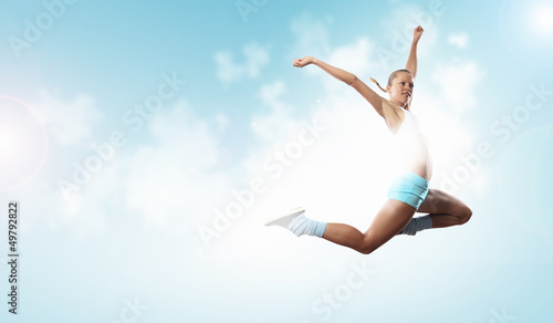 Photo: Image of sport woman jumping Image of sport woman jumping