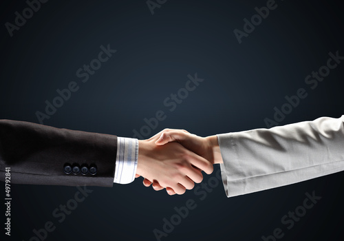 Photo: image of business handshake image of business handshake