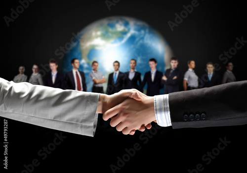Photo: image of business handshake image of business handshake