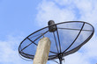 Satellite dish in morning sky 