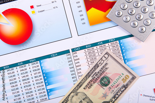 Photo: Financial papers on the table Financial papers on the table