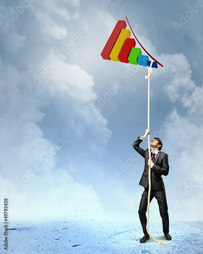 Photo: Image of businessman climbing rope Image of businessman climbing rope