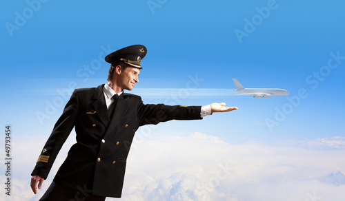Photo: Image of pilot touching air Image of pilot touching air