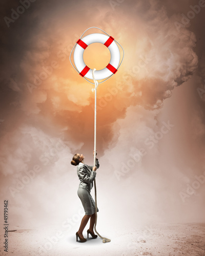 Photo: Image of businesswoman climbing the rope Image of businesswoman climbing the rope