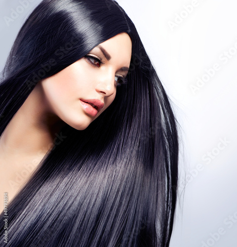 Photo: Beautiful Brunette Girl. Healthy Long Hair Beautiful Brunette Girl. Healthy Long Hair