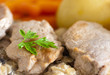 closeup of a pork meat with potatoes and carrot